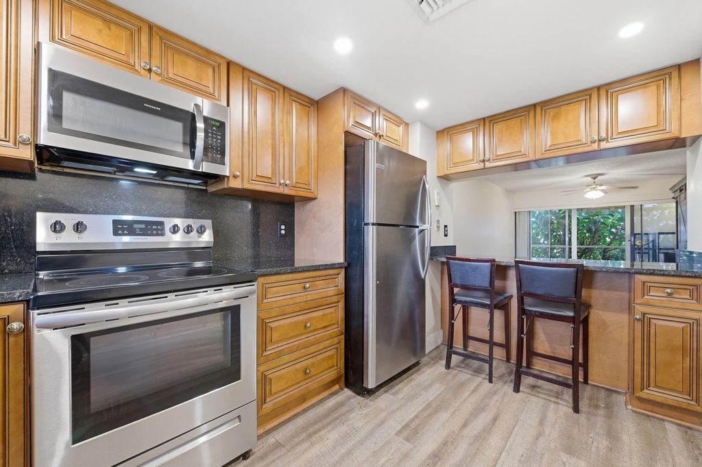 Photo of 1981 W Woolbright Road #E101, Boynton Beach, FL 33426 (MLS # R11168344)