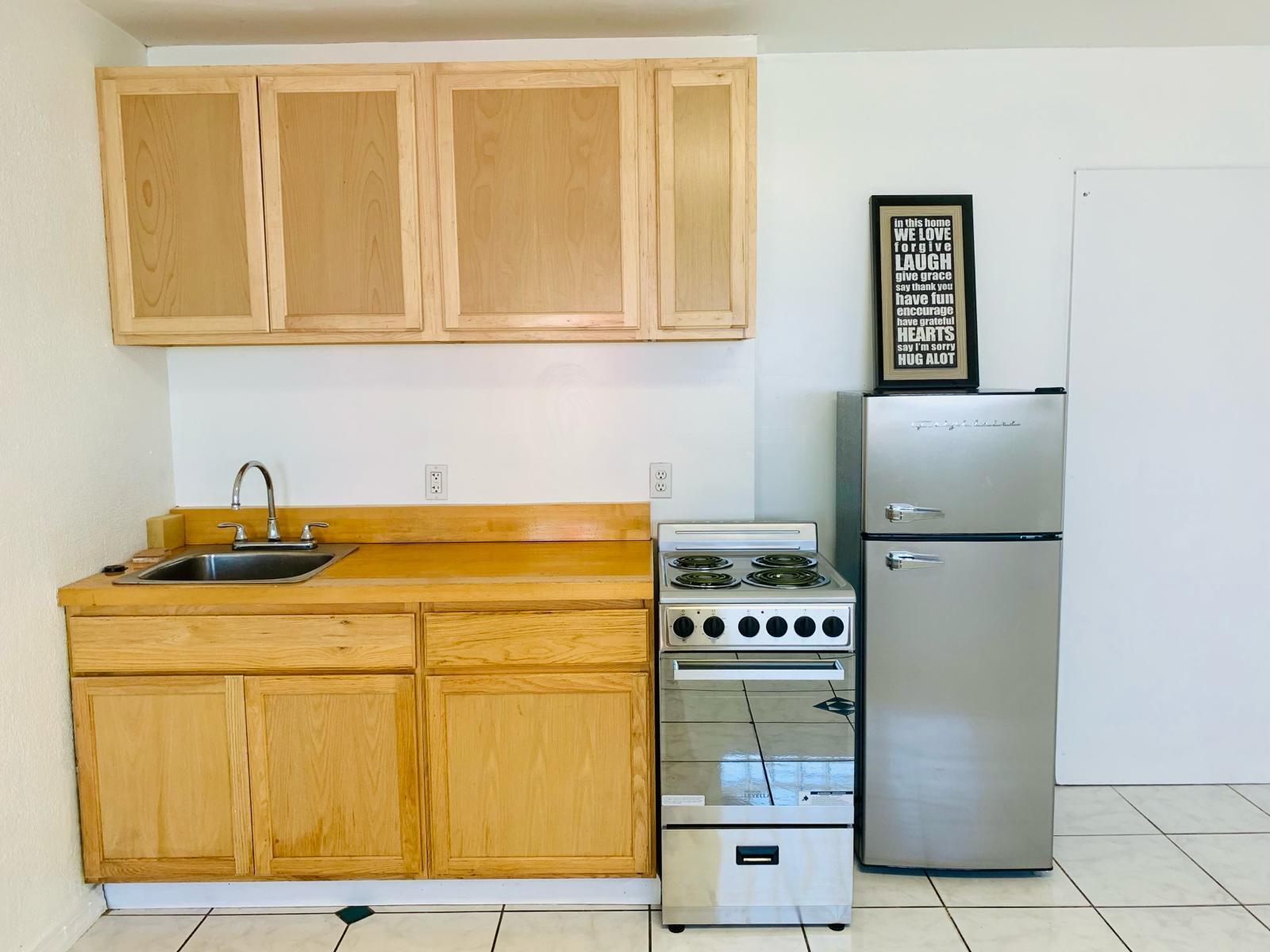 Bright two bedroom apartment is a decently sized 850 square foot space. The bigger bedroom even has it's own sink. It is equipped with a counter top multi-function oven matching up with a brand new stainless steel refrigerator . It's located in Wilton Manors close to central Fort Lauderdale . Rent includes utilities, water, electric , central AC and high speed internet. Ideal for living and work space for a professional person.