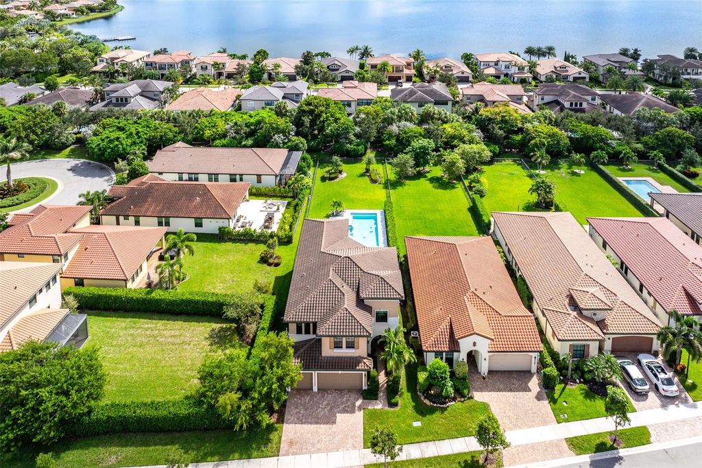 Photo of 8760 E Baypoint Cir, Parkland, FL 33076 (MLS # F10528980)