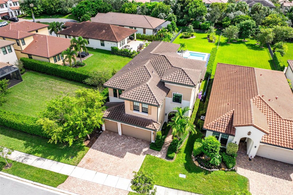 Photo of 8760 E Baypoint Cir, Parkland, FL 33076 (MLS # F10528980)