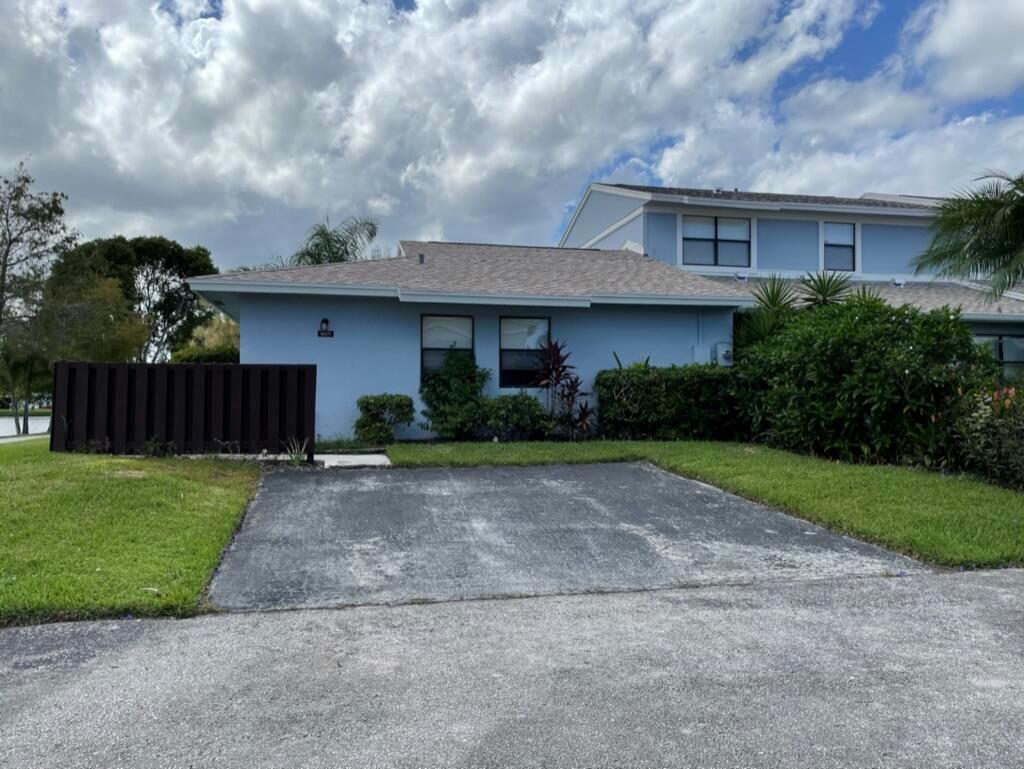 Wake up to breathtaking lake views! This lakeside villa is a 2 bed/2 bath gem featuring fresh paint, wood cabinets, granite countertops, tile through-out, in a gated community. Family fun is guaranteed with a community recreation center including swimming pool, tennis courts, a racquetball court, and a brand new playground to come. Plus a scenic nature path around the lake invites you to embrace the outdoors. Not to mention, you're just a stone's throw away from shopping, schools, and medical facilities. Schedule a viewing today and make this serene villa your new home! Basic cable included. HOA need up to 30 days for approval. NO Smoker, Pets restriction.