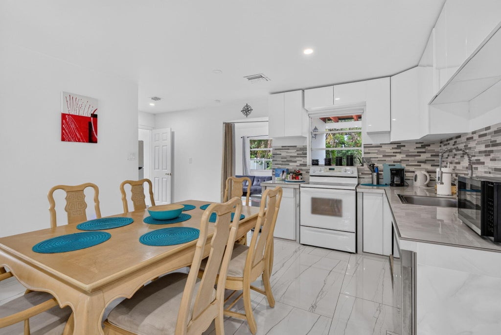 Photo of 210 NE 5TH Avenue, Dania Beach, FL 33004 (MLS # B26072824)