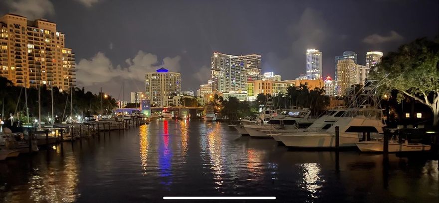 RARE OPPORTUNITY TO OWN A STUNNING 3-STORY MASTERPIECE ON THE WIDEST STRETCH OF FT. LAUDERDALES ICONIC NEW RIVER, COMPLETE W/ A NEW SEAWALL & 70’ FLOATING DOCK! A DRAMATIC, FULL HEIGHT GLASS STAIRCASE, IMPORTED EUROPEAN WT. OAK FLOORS, INTERIOR ATRIUM, & CUSTOM RECLAIMED BARNWOOD CEILING BEAMS SET IT APART! ITALIAN CHEF’S KITCHEN W/ 48” GAS RANGE, 3" CALACATTA MARBLE COUNTERTOPS & OVEN HOOD, & PANELED APPLIANCES WILL AMAZE! EACH BEDROOM OFFERS AN EN SUITE BATHROOM & PRIVATE BALCONY W/ RICH IPE DECKING, WHILE THE SPA-QUALITY PRIMARY BATHROOM CREATES A SANCTUARY OF LUXURY & RELAXATION! 10’ CEILINGS, (2) BUILT IN BBQ’S, LUSH TROPICAL LANDSCAPING, PEBBLE-TEC POOL/SPA, & A PRIVATE ELEVATOR LEADING TO A ROOFTOP W/ SUMMER KITCHEN & PANORAMIC VIEWS OF THE RIVER, CITY SKYLINE, & MARINAS! A "10"!