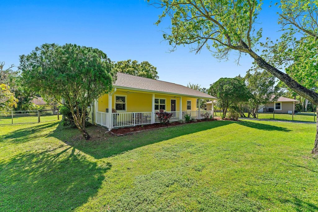 Photo of 11446 154th Road N, Jupiter, FL 33478 (MLS # R10961742)