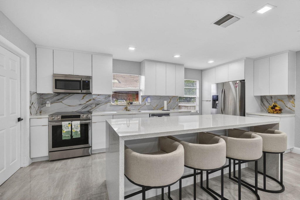 Photo of 800 NW 6th Avenue, Pompano Beach, FL 33060 (MLS # B26037272)