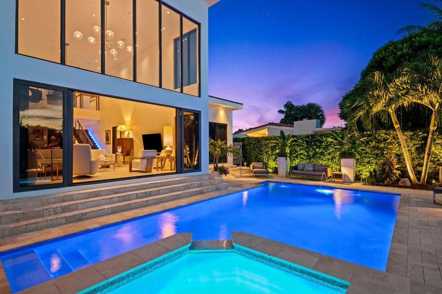 STUNNING ultra modern waterfront in the sought after Coral Shores neighborhood of Ft Lauderdale. South/West exposure, blanketed in sunlight, completed in 2018 by builder/current owner. The home welcomes you with 21’ ceilings w/floor to ceiling windows. 3 beds, loft, gym/office & 3.5 baths. Smart home and multi-level security, Sonos throughout & Lutron lighting and shade automation. Chefs kitchen, Viking appliances with 6 burner gas range, custom cabinetry imported from Spain, 2 dishwashers, wet bar with dual zone wine cooler, wonderful heated salt water pool, hot tub & summer kitchen with beer on tap, Ice maker. Generac whole home generator, gas appliances. Neptune 16K lb. boat lift with Intracoastal access, perfect location, minutes to Coral Ridge Country Club, 1 mile to the beach.