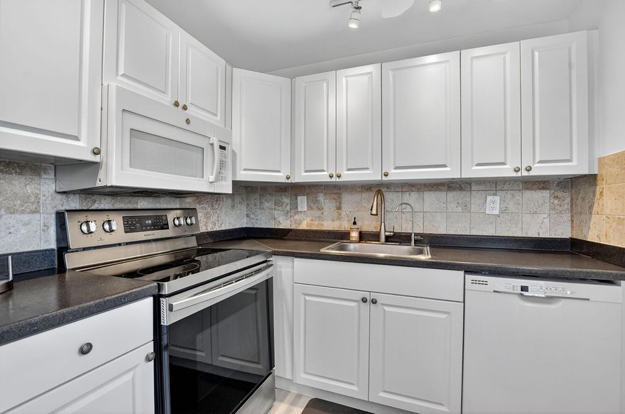 JUST REDUCED! *BLDG HAS NO WAIT TO RENT AFTER PURCHASE!* 2/2 totally upgraded 1st floor on dead end street & located short walk to active Flanders Clubhouse. Updated kitchen w stainless steel appliances, add'l cabinets, 2 showers w 1 rainfall style massage panel. Side scrn'd cov'd patio w newer washer/dryer & front garden view. Park right out front of unit. Most desirable unit in rarely offered building & location. Enjoy all amenities KP offers including 3 multi-million dollar clubhouses, 8 pools including 3 indoor pools, tennis, basketball, pickleball cts, cafes, golf courses, theater, cards, & so much more fun! Close to downtown Delray Beach & Boca Raton w malls, music, arts, culture, restaurants, entertainment, places of worship, beaches & boating. Courtesy shuttle buses everywhere!