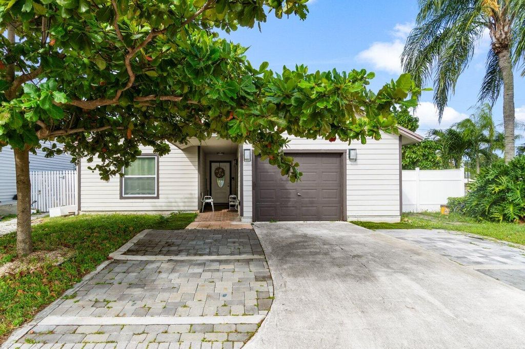 Photo of 4193 Willowood Lane, Lake Worth, FL 33462 (MLS # R11036247)