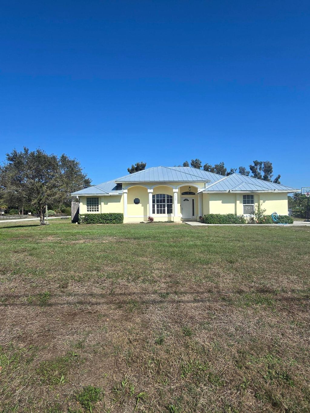 Photo of 7160 Mandarin Boulevard, The Acreage, FL 33470 (MLS # B26010782)