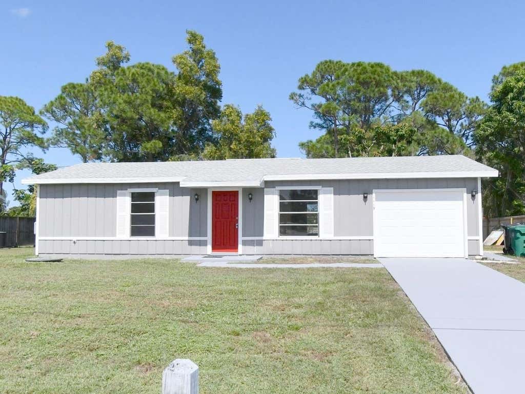 Photo of 1119 S E O'Donnell Lane, Port Saint Lucie, FL 34983 (MLS # B26068742)