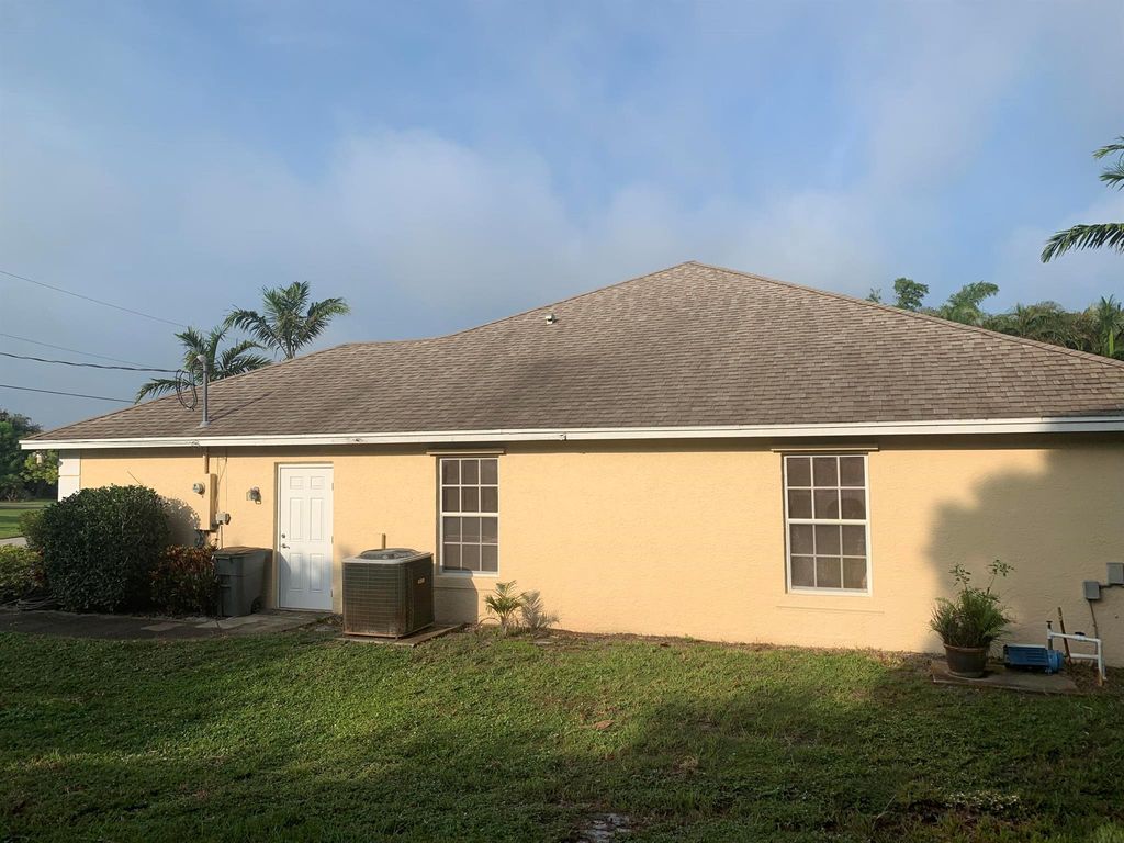 Photo of 601 SE Delancey Lane, Port Saint Lucie, FL 34953 (MLS # R10950334)