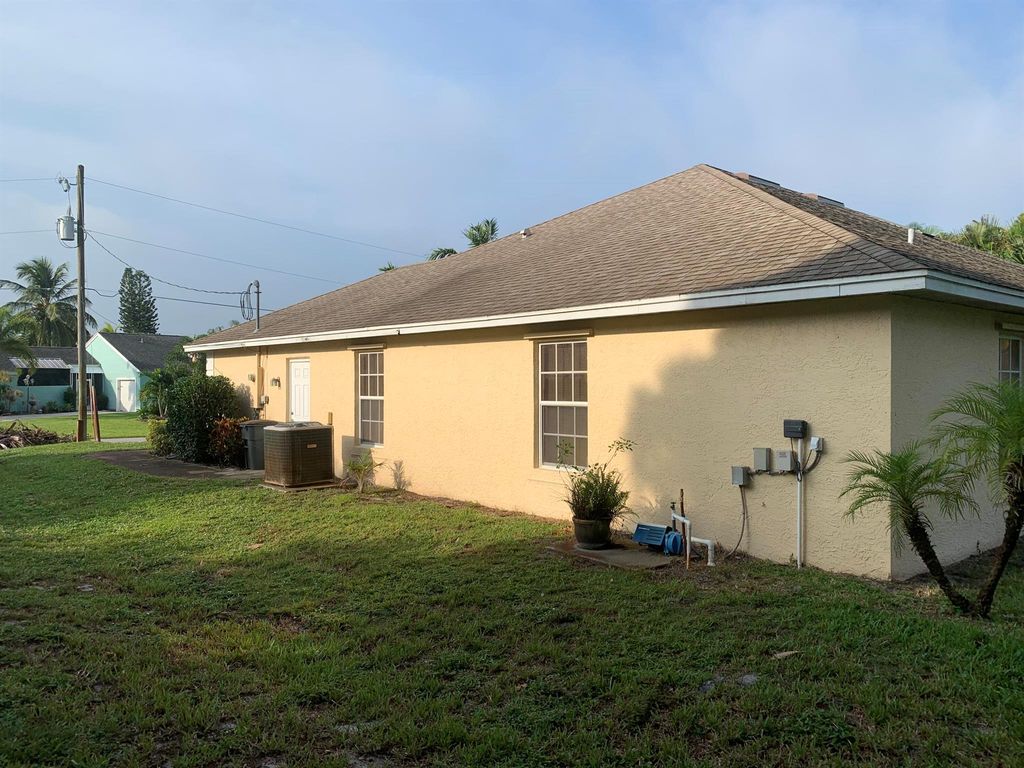 Photo of 601 SE Delancey Lane, Port Saint Lucie, FL 34953 (MLS # R10950334)