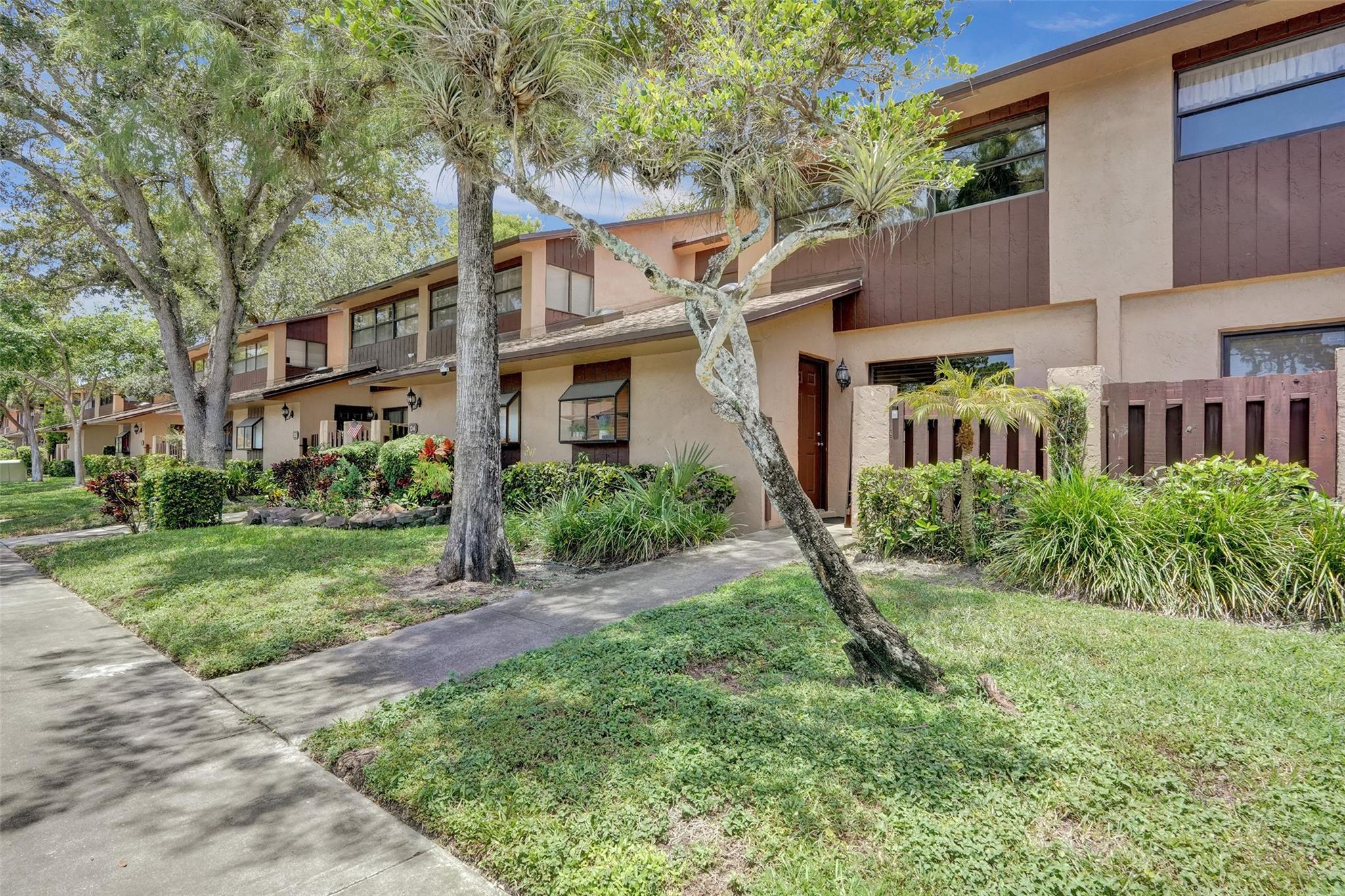 Bright and Beautiful three-bedroom three bath townhome in the highly sought after gated community of Bonaire Village @Woodmont. One of the largest models in Bonaire this home features volume ceilings, beautiful vinyl and tile throughout, eat in kitchen, walk in closets, covered patio, and private fenced yard. Fantastic association maintains building exterior, roof, gym, pool, tennis courts and landscaping in common areas. New roof and HVAC. Enjoy homeownership without the hassle.