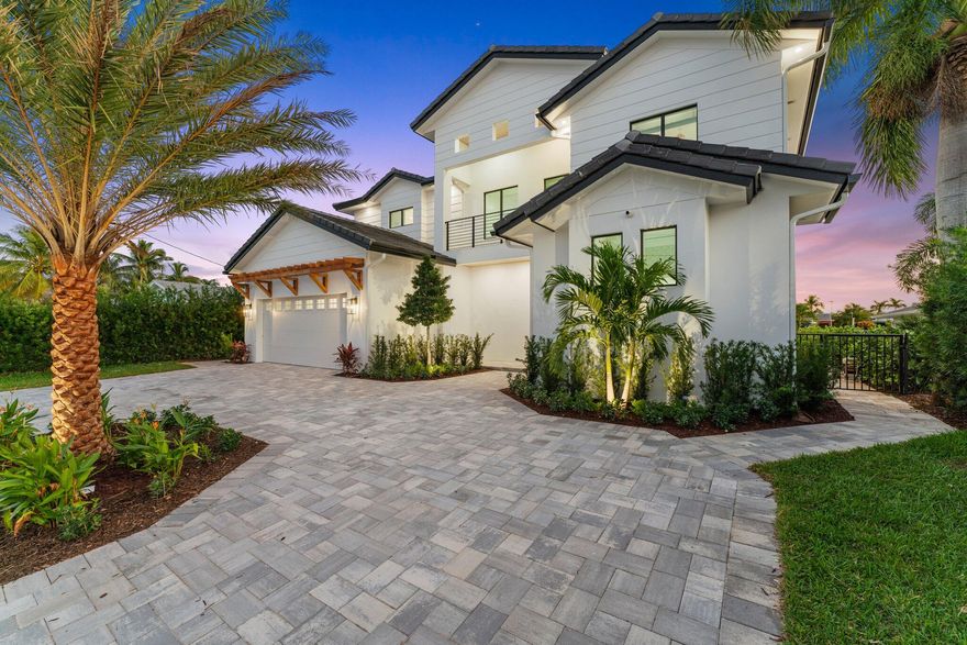 New waterfront construction in The Village of North Palm Beach!  Water views from this 2-story residence with 5BR/6BA and a 2-car garage.  Chef's kitchen with top-of-the-line appliances.  Custom infinity-edge pool and spa; summer kitchen.  75' of water frontage with easy ICW and Ocean access.