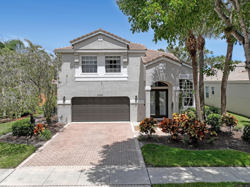 Photo of 2063 Reston Circle, Royal Palm Beach, FL 33411 (MLS # B26070871)