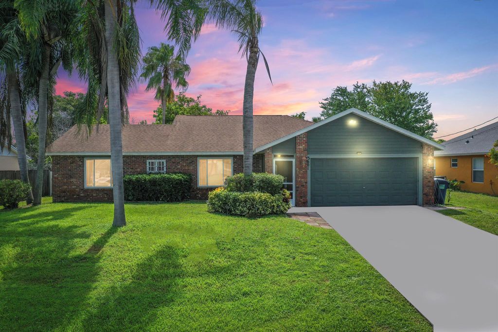 Photo of 3601 SW Voyager Street, Port St Lucie, FL 34953 (MLS # R10903299)
