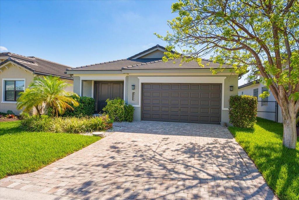 Photo of 7449 Moonrise Drive, Lake Worth, FL 33467 (MLS # R11093090)