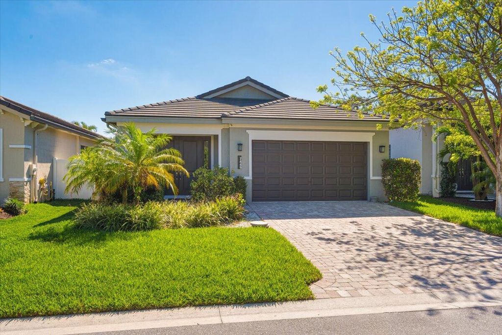 Photo of 7449 Moonrise Drive, Lake Worth, FL 33467 (MLS # R11093090)