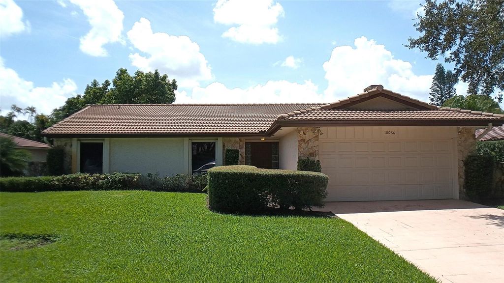 Photo of 10066 NW 20th St, Coral Springs, FL 33071 (MLS # F10394759)
