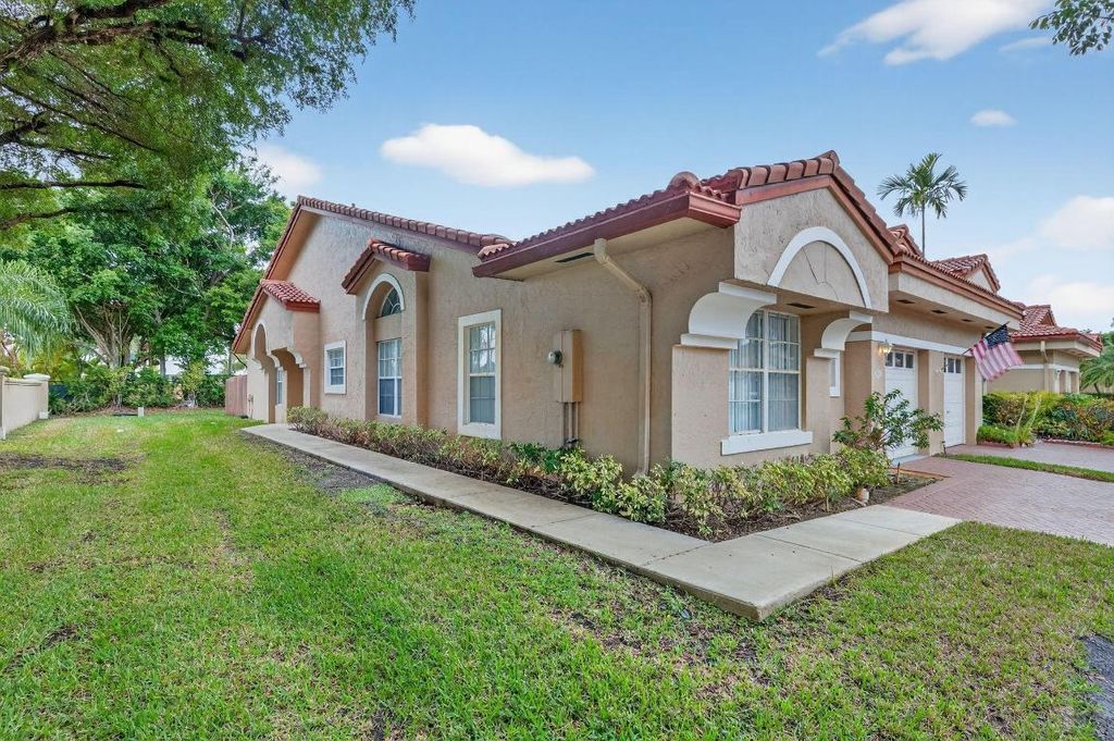 Photo of 9910 Malvern Drive, Tamarac, FL 33321 (MLS # R11155855)