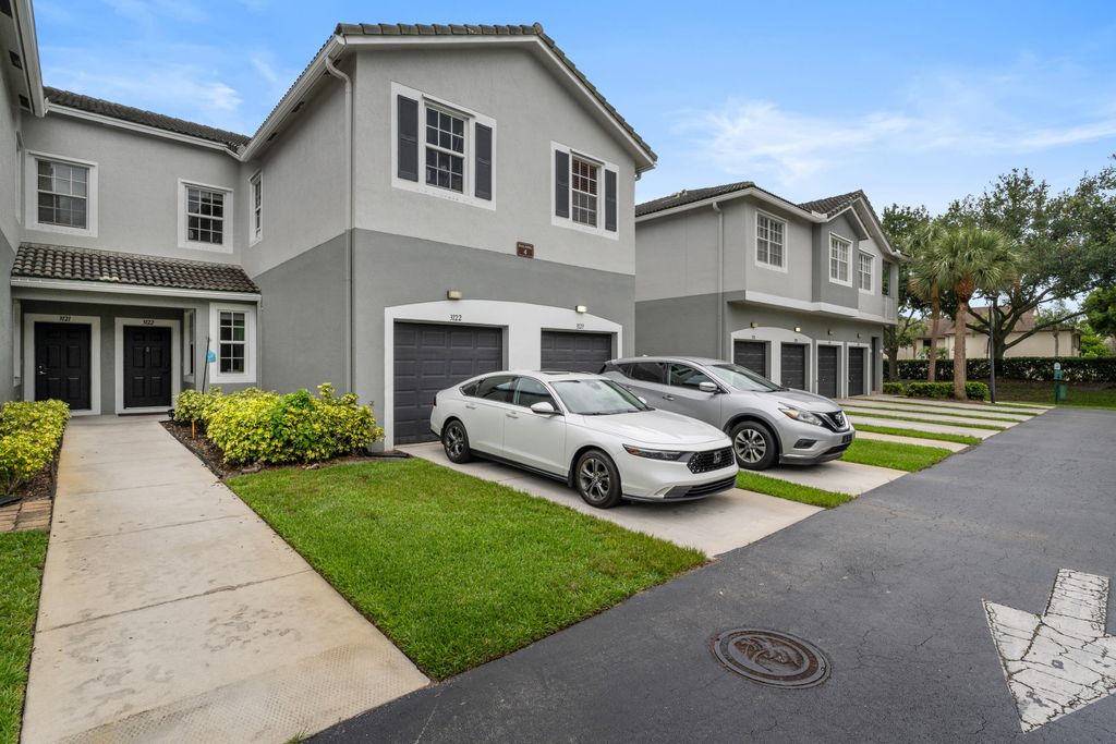 Photo of 3122 Grandiflora Drive, Greenacres, FL 33467 (MLS # B26035936)