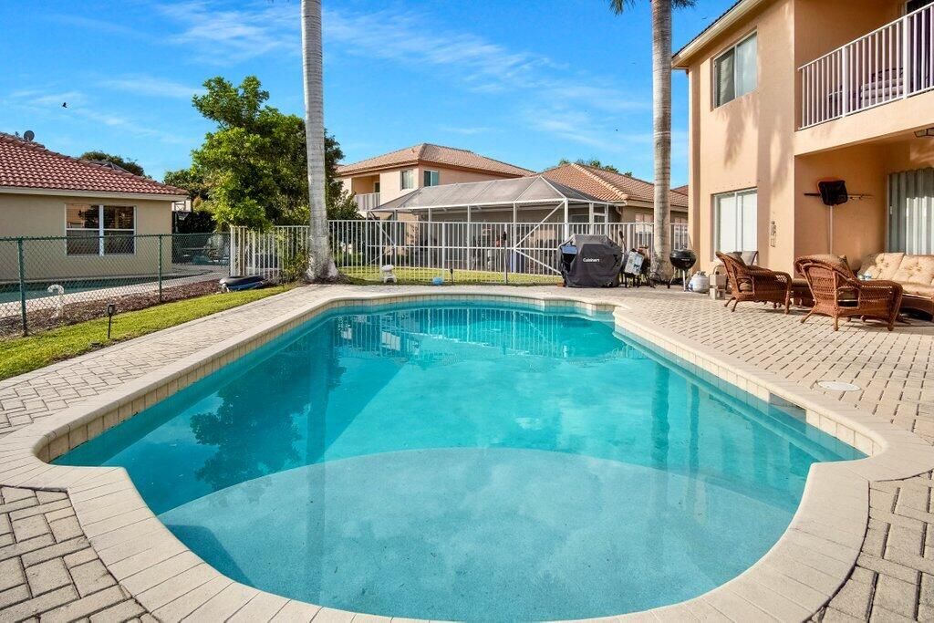 Photo of 2101 Little Torch Street, Riviera Beach, FL 33407 (MLS # R10870194)