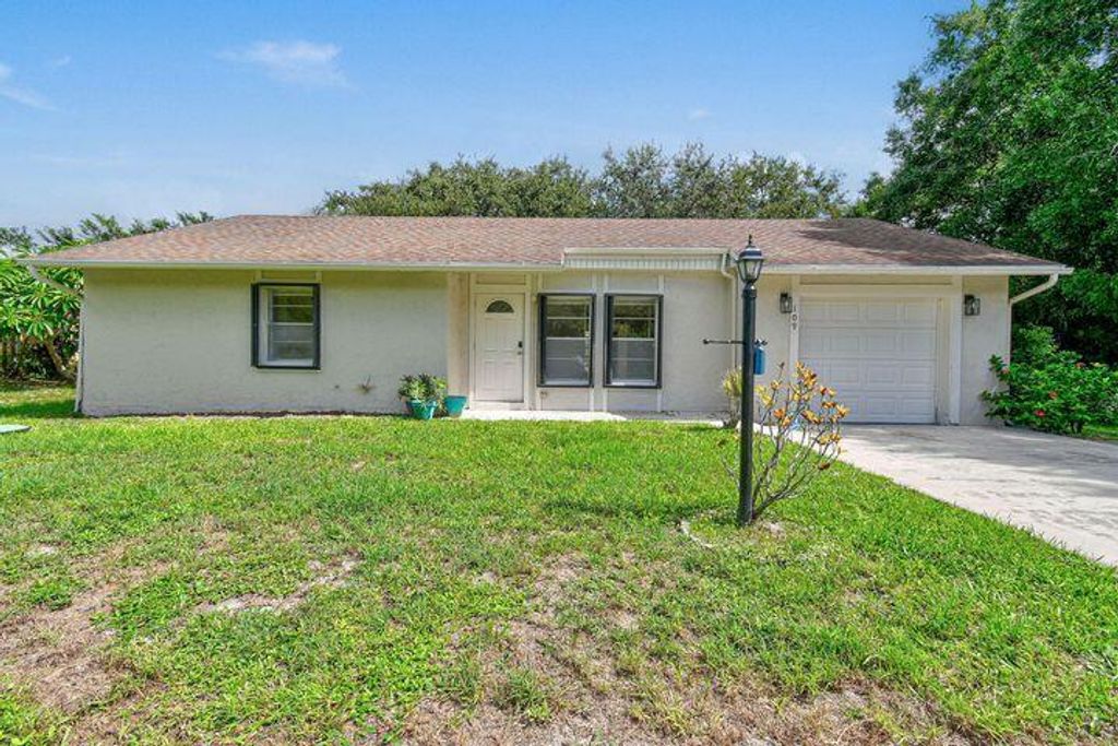 Photo of 109 SW Essex Drive, Port Saint Lucie, FL 34984 (MLS # R11124202)