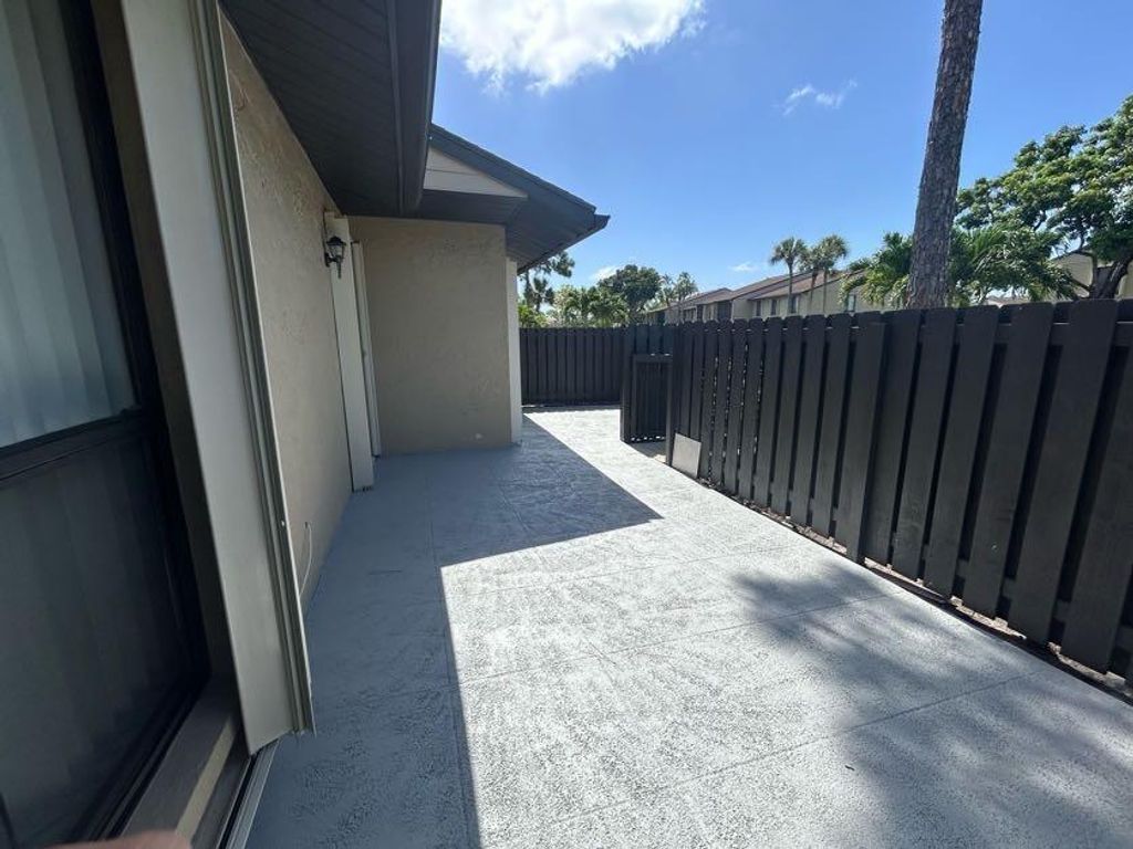 Photo of 725 Sunny Pine Way #A, Greenacres, FL 33415 (MLS # R11134504)