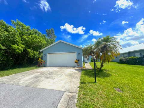 Photo of 2414 SW REGENCY Road, Stuart, FL 34997 (MLS # B26057298)