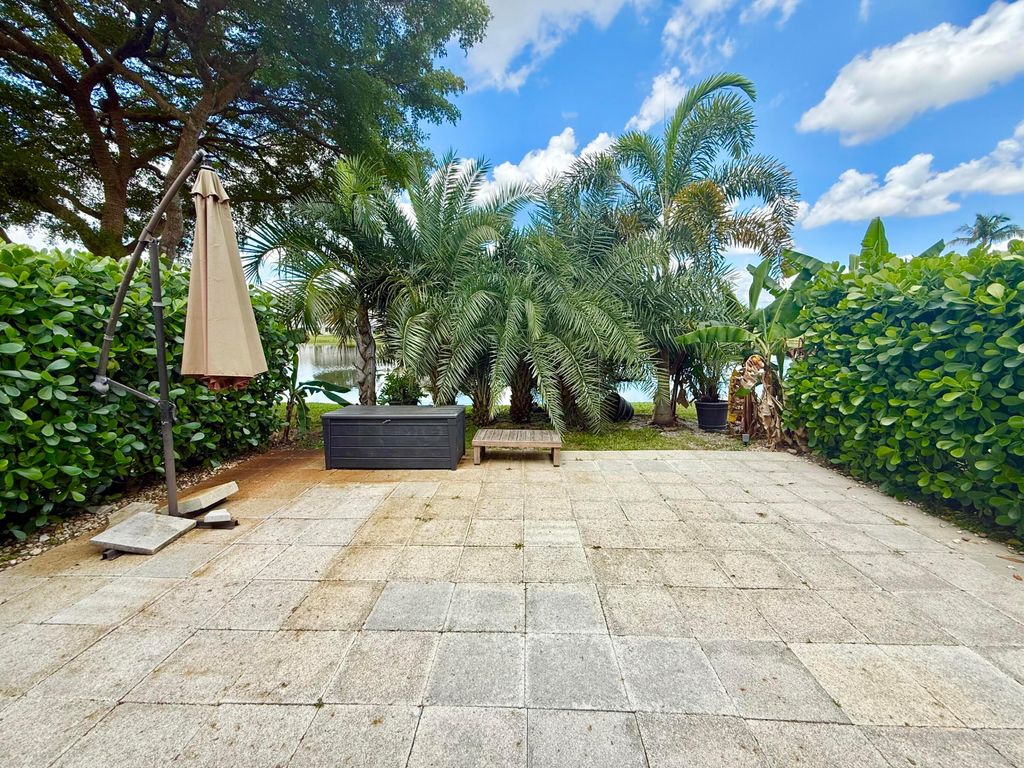 Photo of 9190 Boca Gardens Parkway #B, Boca Raton, FL 33496 (MLS # B26021852)