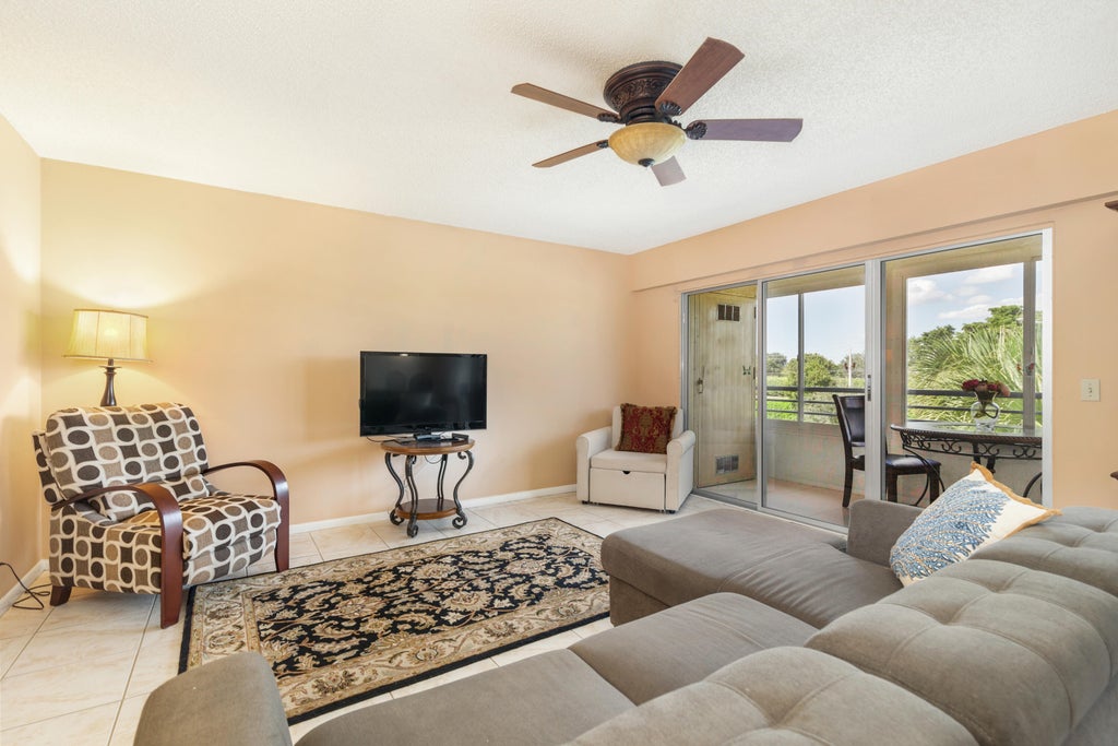 Photo of 203 SUFFOLK E #E, Boca Raton, FL 33434 (MLS # B26088304)