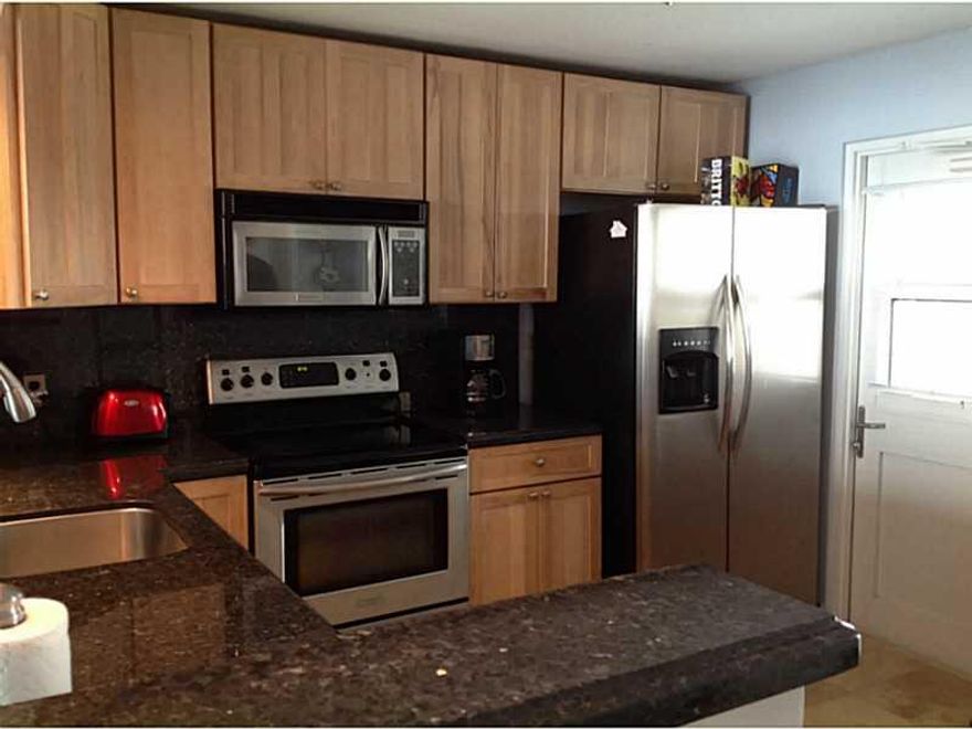 2 bedroom unit.  Beautiful renovated unit with upscale 18x18 beautiful travertine title throughout unit.  Move in ready. Stunning ocean front view with catwalk intracoastal views.  Lots of closet space, .  PETS WELCOME.  Balcony views are breathtaking, Ha ve your morning coffee while the sun comes up.  2nd bedroom/den was added to make this unit even more appealing.  Great for investor unit is rented with tenant in place for 1 year so no hold period. Now is the time to buy today and earn income tomorrow.