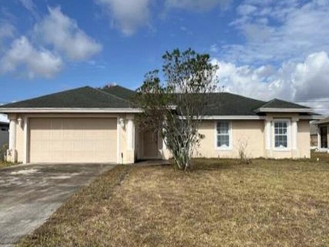 Photo of 1944 SW Breezeway Street, Port Saint Lucie, FL 34987 (MLS # B26035788)