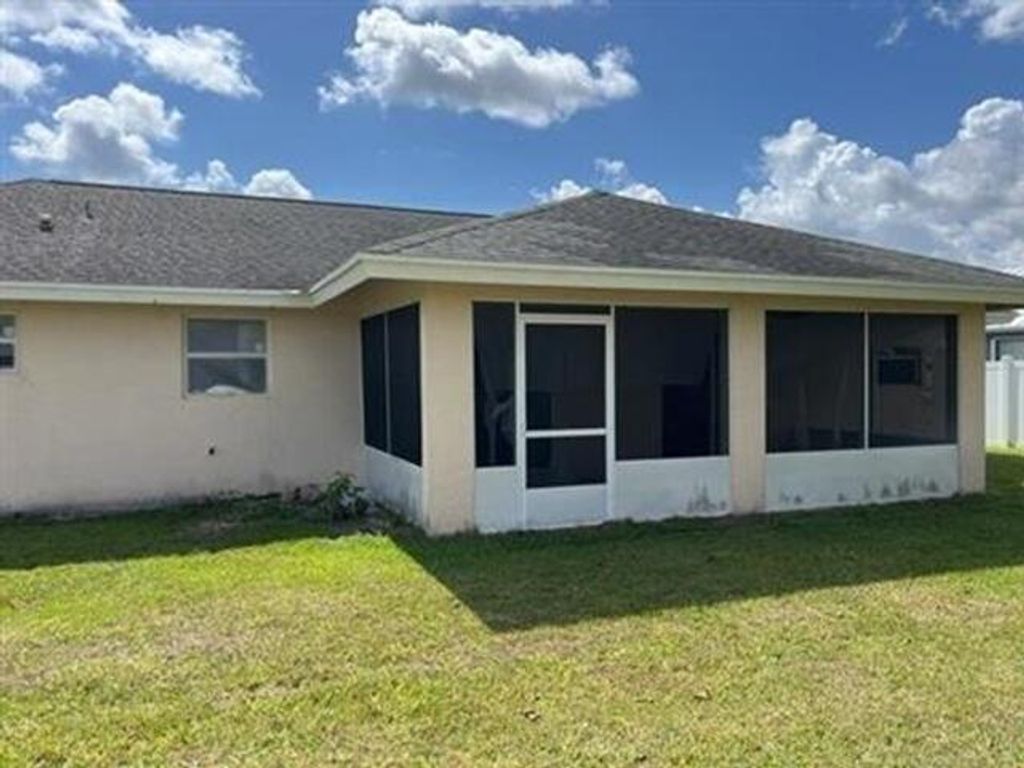 Photo of 1944 SW Breezeway Street, Port Saint Lucie, FL 34987 (MLS # B26035788)