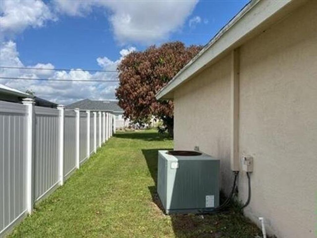 Photo of 1944 SW Breezeway Street, Port Saint Lucie, FL 34987 (MLS # B26035788)