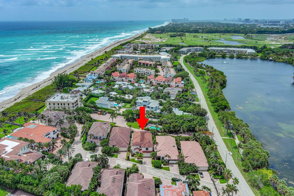 Photo of 303 Alicante Drive, Juno Beach, FL 33408 (MLS # R10999465)