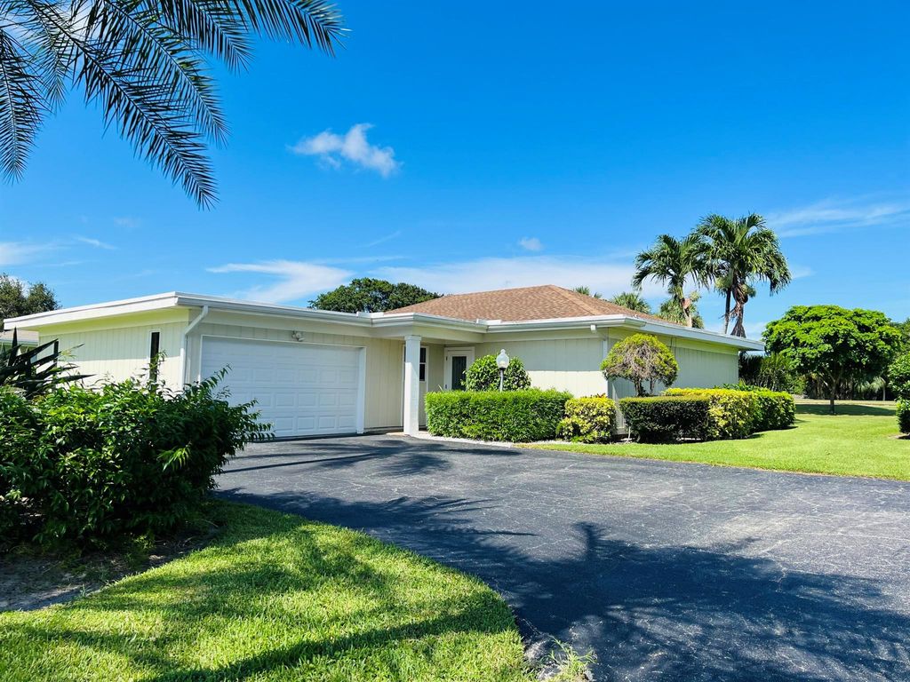 Photo of 13564 Whispering Lakes Lane, Palm Beach Gardens, FL 33418 (MLS # R10912333)