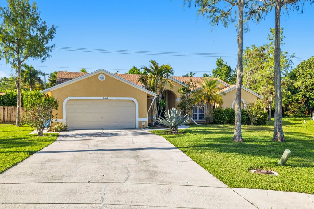 Photo of 104 Oxford Court, Royal Palm Beach, FL 33411 (MLS # B26023561)