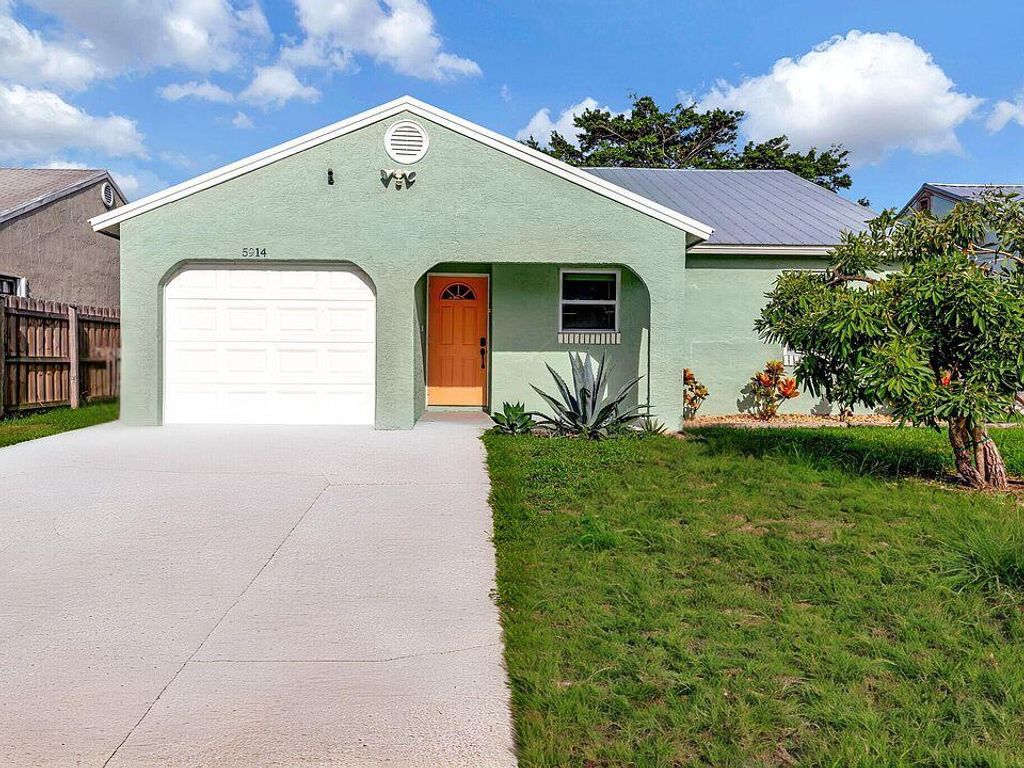 Photo of 5914 SE Mitzi Lane, Stuart, FL 34997 (MLS # R11099505)