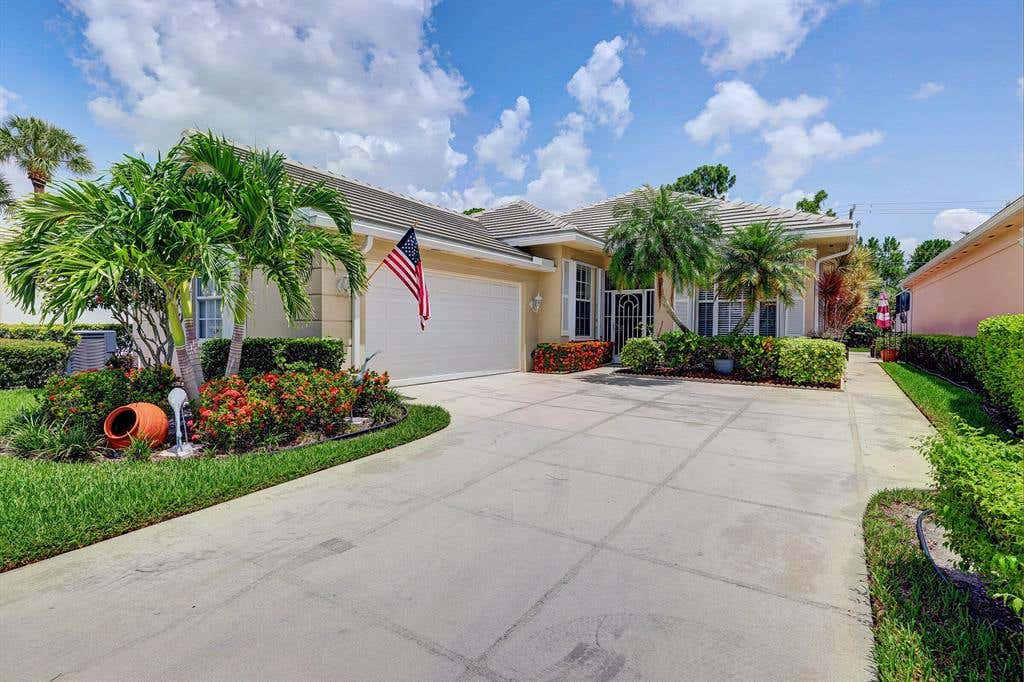 Photo of 260 NW Bentley Circle Cir, Port Saint Lucie, FL 34986 (MLS # R10809360)