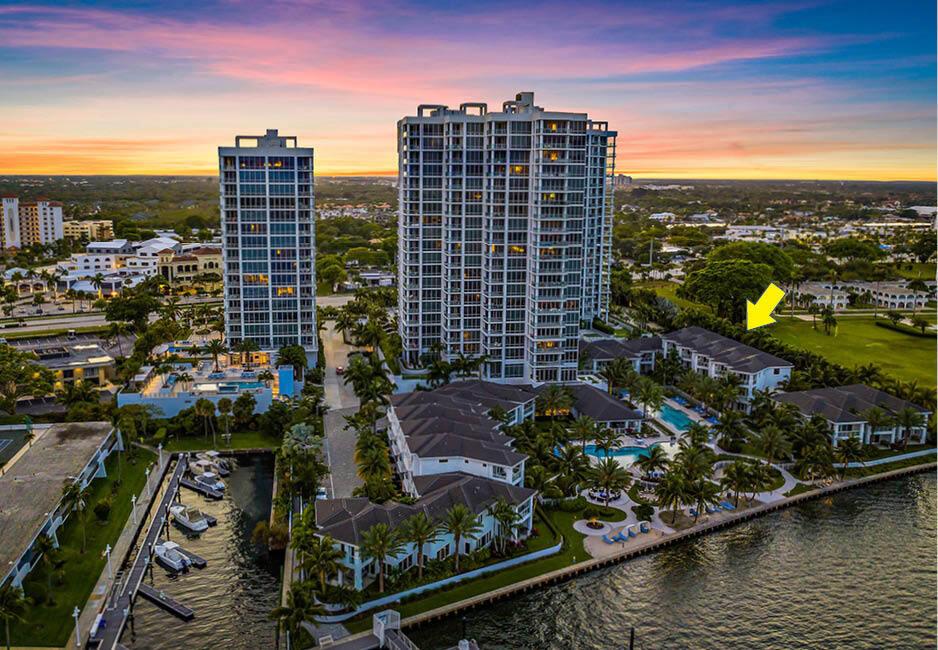 This luxurious three story Water Club townhouse features stunning views and the opportunity to live in a true tropical paradise. Featuring 3 bedrooms, 4 bathrooms and 4,138 total square feet, this desirable townhouse is perfect for entertaining. Notable features include an open floor plan, gourmet kitchen with large island, two private patio decks, summer kitchen, high ceilings, living areas filled with bright natural light, and private 2 car garage. The Water Club offers first-rate amenities including 24-hour front desk service, resort-style pool, lap pool, spa, elegant clubhouse, fully equipped fitness center and dedicated boat slips.