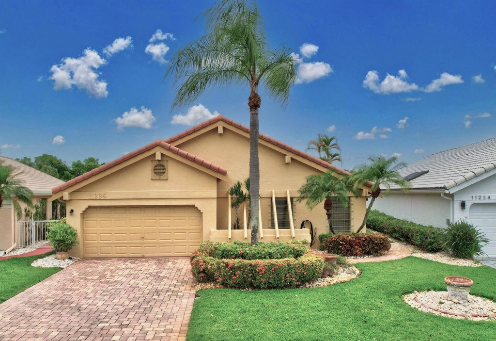 Photo of 11228 Clover Leaf Circle, Boca Raton, FL 33428 (MLS # R10907571)