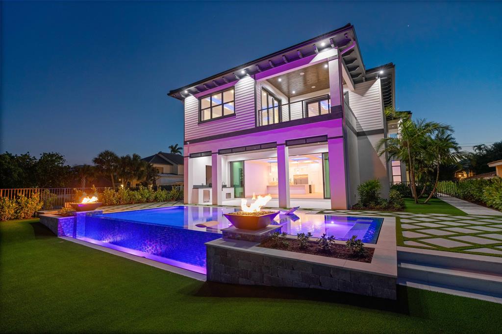 BRAND NEW MOVE IN READY custom waterfront home on the coveted north end of Hypoluxo Island with views of both east and west Intracoastal waters! Private dock and new seawall, direct ocean access and no fixed bridges just minutes to the Inlet! This home offers 6 bedrooms, 7.5 baths, 3 car garage with appropriate volume for lifts and tranquil saltwater pool and outdoor entertaining area. Beautifully designed kitchen with Thermador appliances and hidden walk-in pantry in addition to fully outfitted bar and entertaining space. Ample flex space to accommodate a home gym, office, theater, game room and more! This amazing location is just minutes from Palm Beach and all of the best dining, shopping and beautiful beaches. Call today for a private showing!