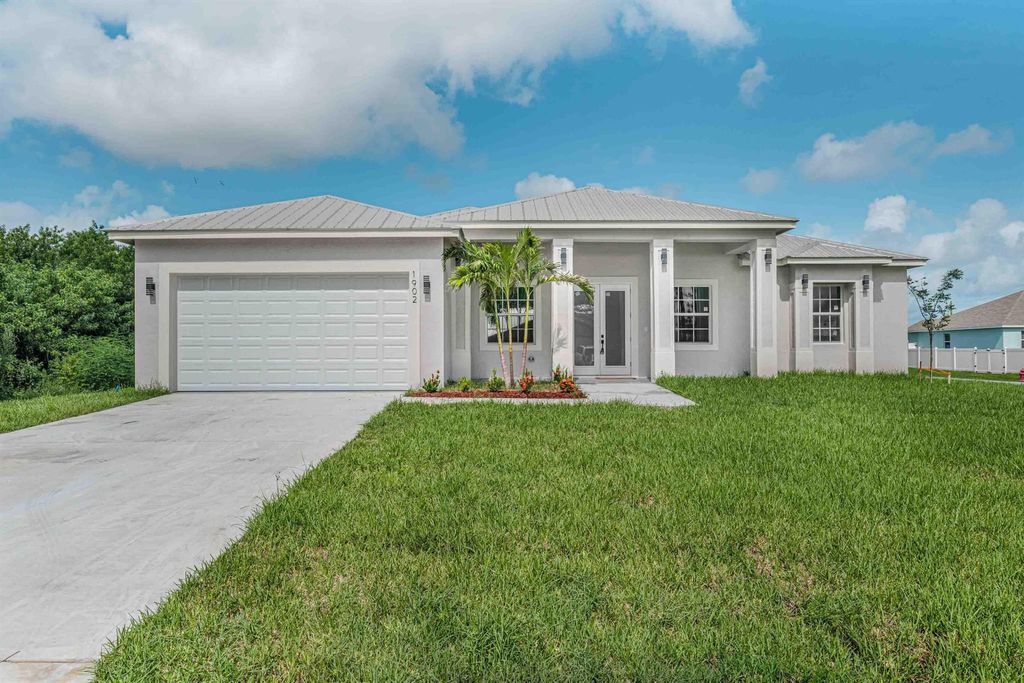 Photo of 5817 NW Zenith Drive, Port Saint Lucie, FL 34986 (MLS # R11101036)