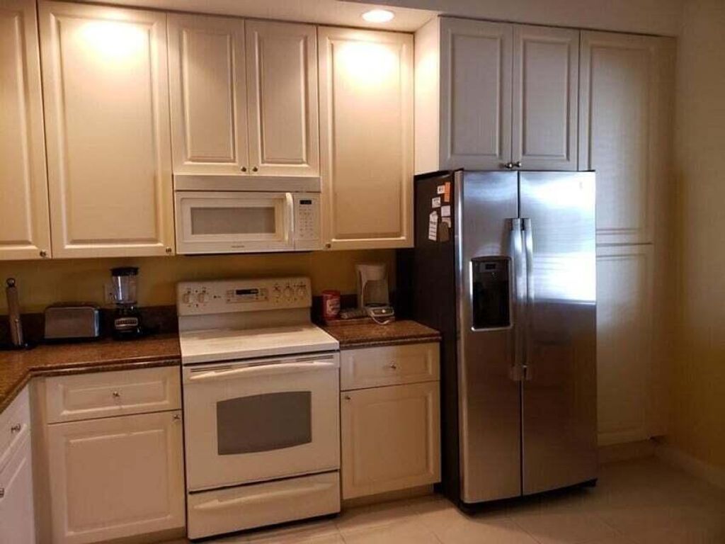 Photo of 13 Harbour Isle Drive W #101, Fort Pierce, FL 34949 (MLS # R10968266)