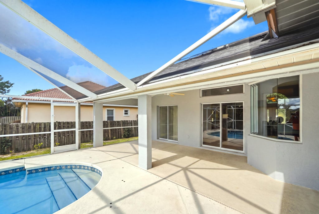 Photo of 3461 SW SAN BENITO Street, Port Saint Lucie, FL 34953 (MLS # B26062171)