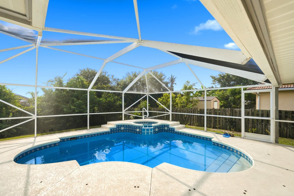 Photo of 3461 SW SAN BENITO Street, Port Saint Lucie, FL 34953 (MLS # B26062171)