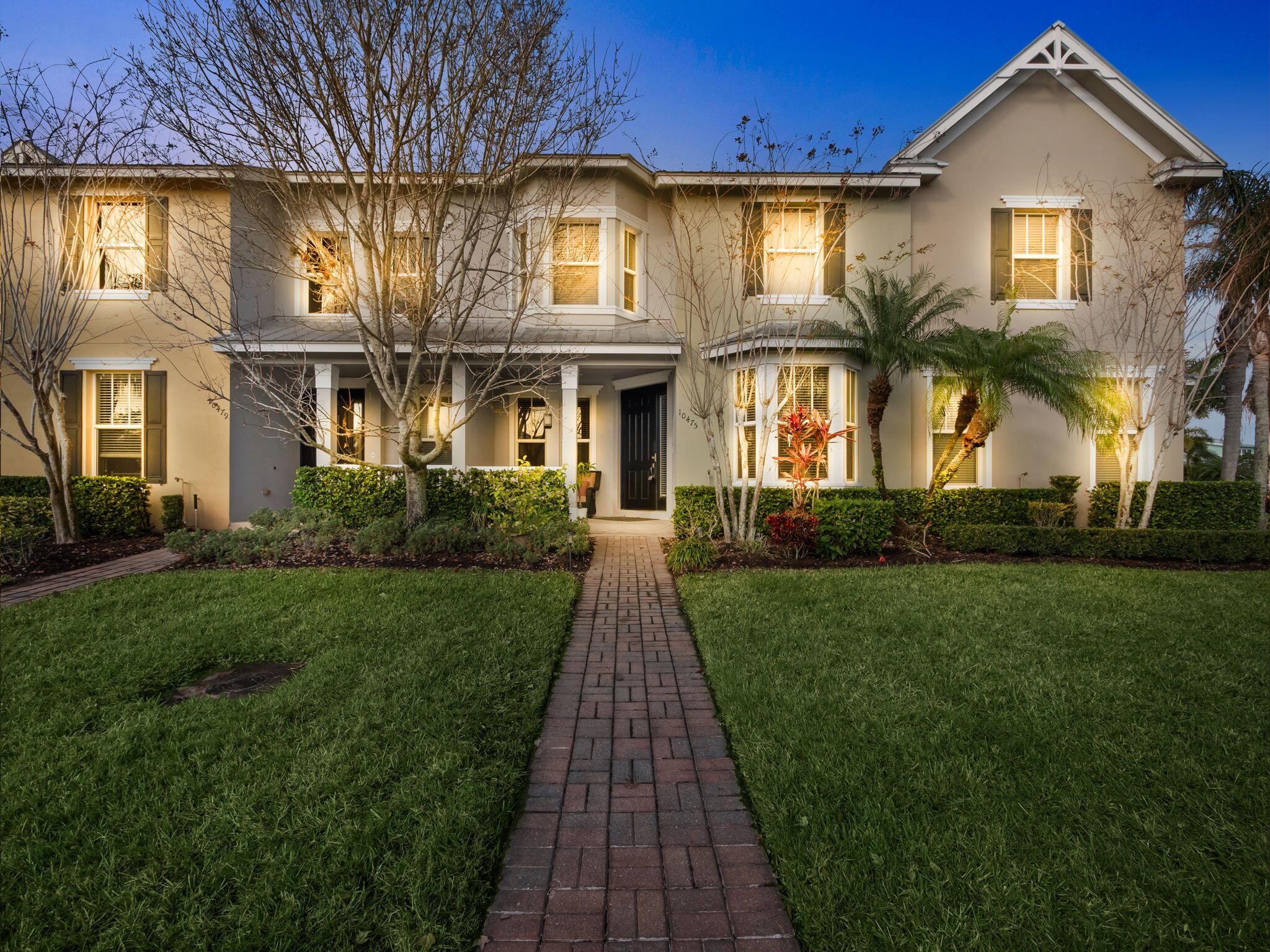 Beautifully maintained 3-bedroom, 2.5-bathroom townhome in Bedford Park at Tradition. A spacious and inviting floor plan designed for both comfort and style. Step inside to discover elegant 8'' x 48'' porcelain plank tile flooring throughout, featuring Mediterranea Boardwalk - Myrtle Beach for a sleek, modern touch. The open-concept living and dining areas provide the perfect space for entertaining, while the well-appointed kitchen offers ample cabinetry and counter space. Enjoy peace of mind with impact glass windows in the front and metal shutters in the rear (alleyway) covering the windows and entry door for added storm protection. HOA dues include: Cable, Internet, alarm monitoring, lawn care, exterior painting of the building, roof reserves, community pool and clubhouse and much more