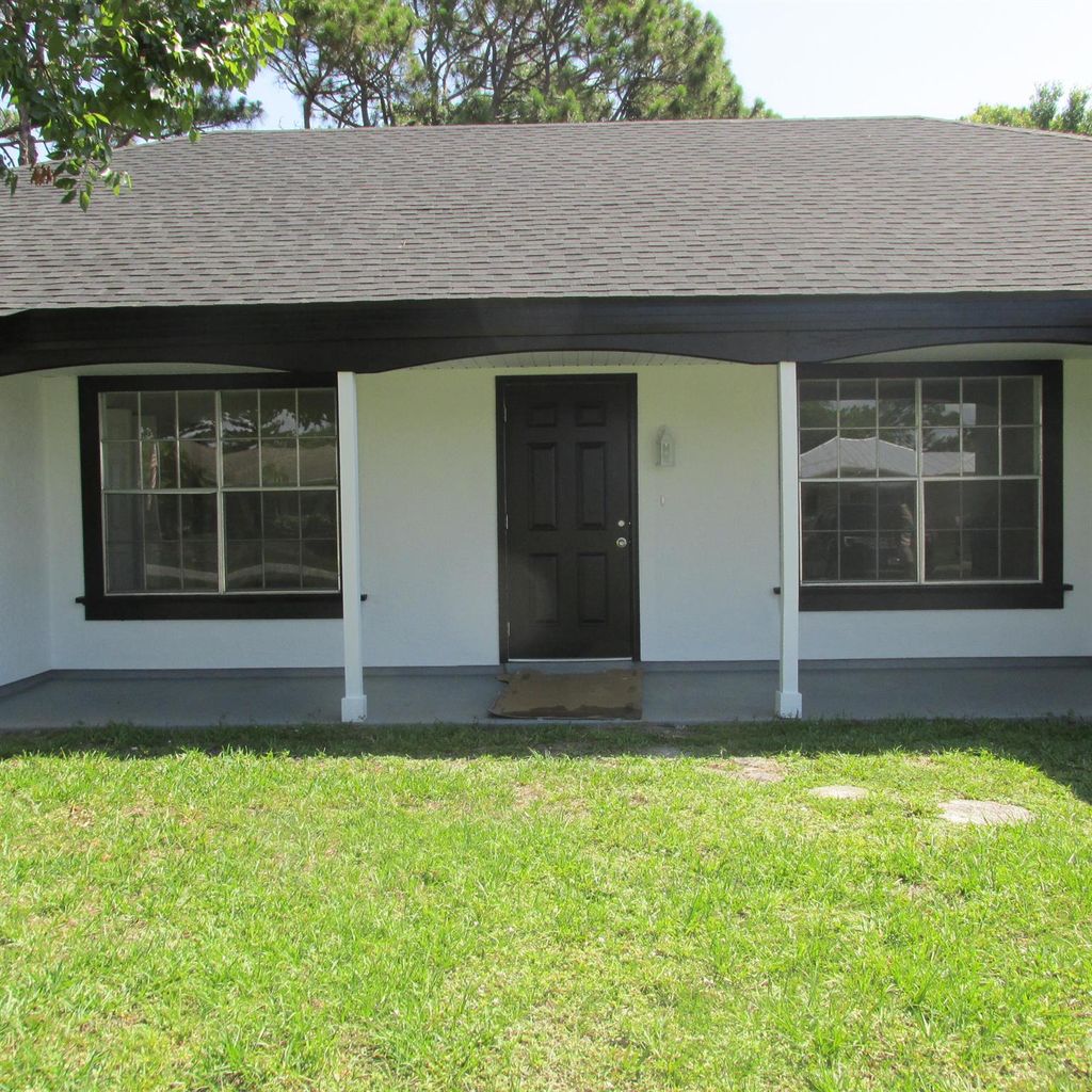 Photo of 2137 SE Dolphin Road, Port Saint Lucie, FL 34952 (MLS # R11096312)