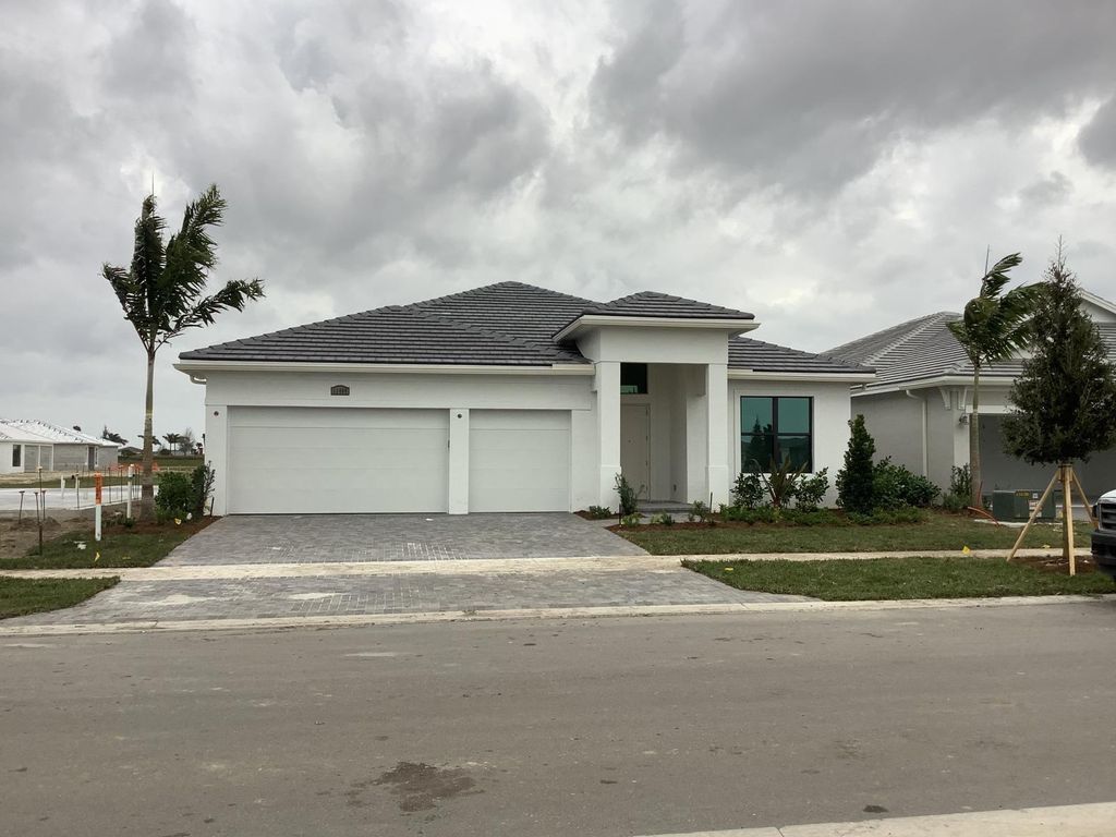 Photo of 11406 SW Margave Way, Port Saint Lucie, FL 34987 (MLS # F10423333)